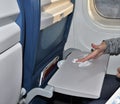 Wiping dirty airplane tray