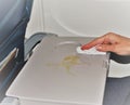 Wiping dirty airplane tray