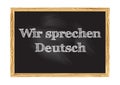 Wir sprechen Deutsch - We speak German in German blackboard notice Vector illustration