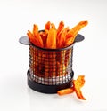 Wire basket filled with fried sweet potato chips