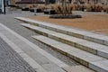 wire circular benches park furniture in winter. sintered gravel with