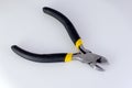 Wire cutters or pliers on a white background Royalty Free Stock Photo
