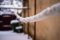 Wire fence and metallic net with snow. Metal net in winter covered with snow Royalty Free Stock Photo