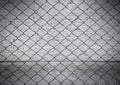 Wire fence with Old white brick wall background Royalty Free Stock Photo