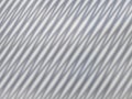 wire fence shadow pattern on white background