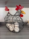 Wire Hen Basket with Fresh Eggs Royalty Free Stock Photo