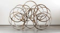 A wire sculpture of eight intersecting circles creating a beautiful and complex octet structure Royalty Free Stock Photo