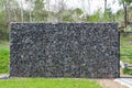 Wire and stone fence. decorative building made of stone Gabion