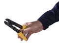 Wire stripper in the hands Royalty Free Stock Photo