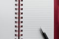 Wirebound Notebook and Black Pen. Royalty Free Stock Photo