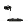 Wired in-ear earbuds with inline remote control and microphone Royalty Free Stock Photo