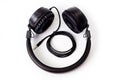 Wired headphones, black, with soft inserts, great sound, shot on a white background