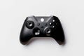 Wireless black gaming controller device isolated on white Royalty Free Stock Photo