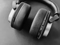 Wireless black headphones made of genuine soft leather Royalty Free Stock Photo