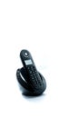 Wireless black telephone with cradle isolated on white background Royalty Free Stock Photo
