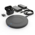Wireless Charging Pad, Earbuds, Power Bank, and Cables Set Royalty Free Stock Photo