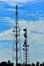 Wireless Communication Antenna With bright sky. Royalty Free Stock Photo