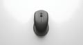 Wireless ergonomic mouse in neutral gray color with sleek design on white surface Royalty Free Stock Photo