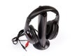 Wireless full size headphones on emitter on a white background