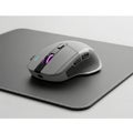 Wireless gaming mouse on mousepad isolated on white background Royalty Free Stock Photo