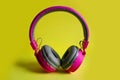 Wireless Headphones On Yellow Background. Music Concept.