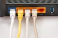 Wireless internet router with connected cables Royalty Free Stock Photo