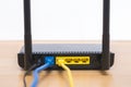 Wireless modem router with cable connecting Royalty Free Stock Photo