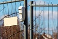 Wireless motion detector on a metal temporary fence