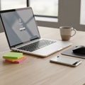 A wireless mouse on a mouse pad and a ceramic cup filled with Royalty Free Stock Photo