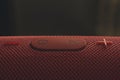 Wireless music column. Red wireless speaker with bass. Royalty Free Stock Photo