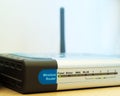 Wireless router on a desk Royalty Free Stock Photo