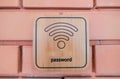 Wireless sign on wooden board on the brick wall