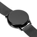 Wireless smart watch in a round glossy black case on a metal strap with a blank screen for a logo Royalty Free Stock Photo