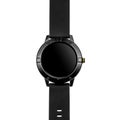 Wireless smart watch in a round glossy black case on a metal strap Royalty Free Stock Photo