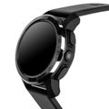 Wireless smart watch in a round glossy black case Royalty Free Stock Photo