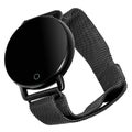 Wireless smart watch in a round matte black case on a metal strap with a blank screen for a logo Royalty Free Stock Photo