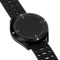 Wireless smart watch in a round matte black case with numbers on the display Royalty Free Stock Photo