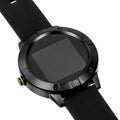 Wireless smart watch in a round matte black case on silicone strap Royalty Free Stock Photo