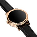 Wireless smart watch in a round shiny gold case and a black leather strap Royalty Free Stock Photo