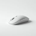 A wireless white computer mouse with a sleek, minimalist design. It features a scroll
