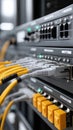 Wires and connectors fill a server mainframe, illuminated by a single light bulb, showcasing advanced data center technology Royalty Free Stock Photo
