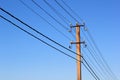 Wires and power line insulators on an electrical pole Royalty Free Stock Photo