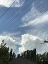 wires of the roof of the house and the trees in the frame. Royalty Free Stock Photo