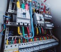 Wires and switches in electric box. Electrical panel with fuses and contactors Royalty Free Stock Photo