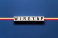 Wiretap word concept on cubes Royalty Free Stock Photo