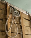 wiring of electrical wires in a wooden house. construction and renovation Royalty Free Stock Photo