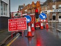 Wirral, UK - Dec 31 2023: A three way traffic control system in place at roadworks in an urban area of UK. Royalty Free Stock Photo