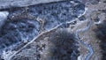 Wisconsin Arctic farmland with spiral frozen river and woods Royalty Free Stock Photo