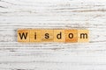 Wisdom word made with wooden blocks concept Royalty Free Stock Photo