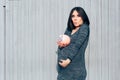 Happy Pregnant Woman Holding Piggy Bank Royalty Free Stock Photo